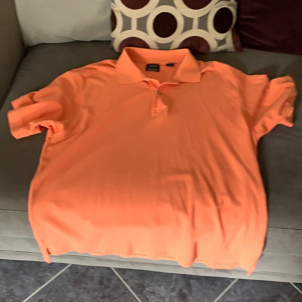 Orange Izod polo short sleeve shirt